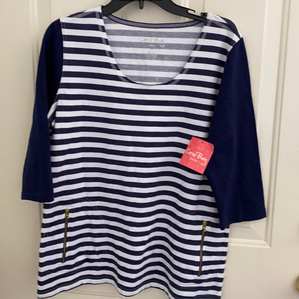 Blue and white shirt. Brand new with tags.